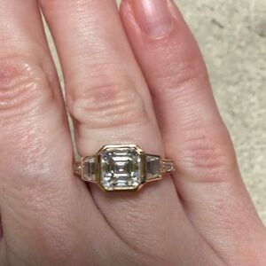 14k rose gold multi stone asscher cut bezel ring.
